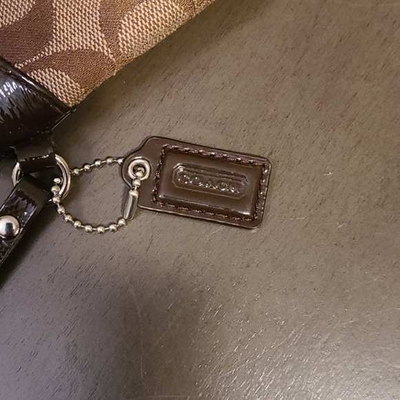 New without tags, tan and brown Coach wristlet - Picture 2 of 6
